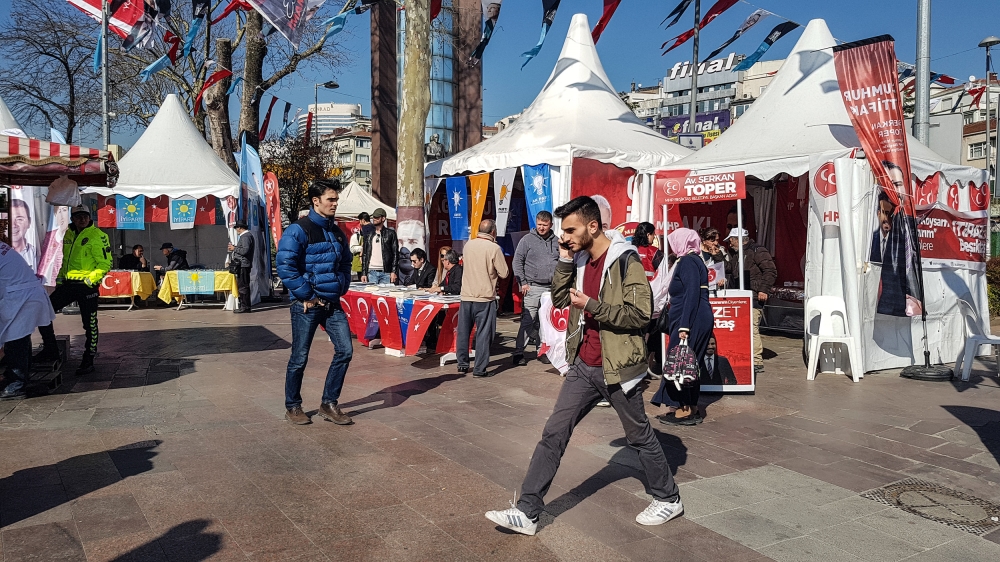 Political parties have set up stalls in the squares and streets of Istanbul [Umut Uras/Al Jazeera]