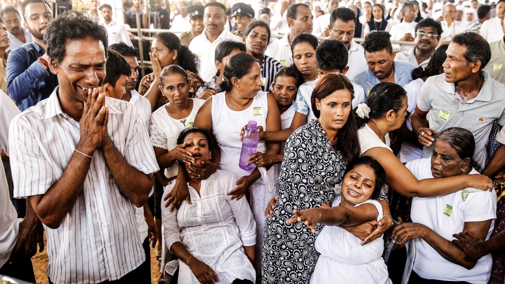 Mass funerals were taking place in Negombo, two days after the attacks [Thomas Peter/Reuters]