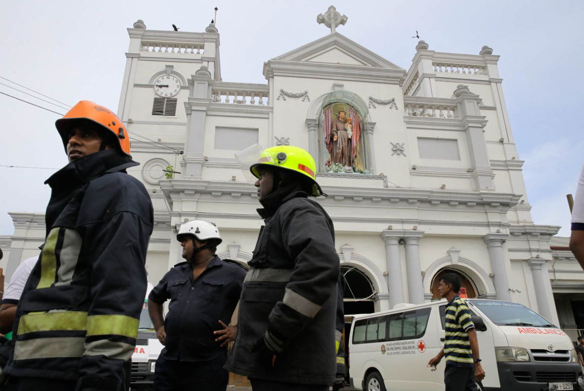 Sri Lankan firefighters stand in the area around St. Anthony''s Shrine after a blast in Colombo, Sri Lanka, Sunday, April 21, 2019. Witnesses are reporting two explosions have hit two churches in Sri L