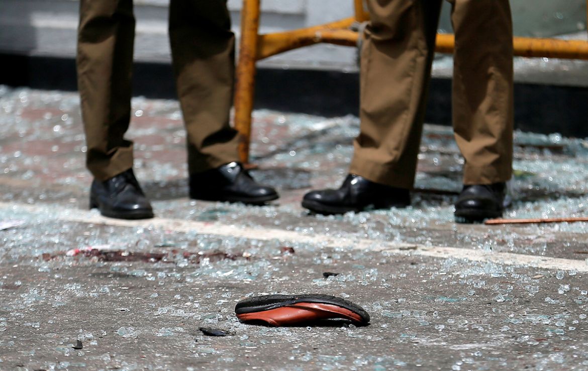 A shoe of a victim is seen in front of the St. Anthony''s Shrine, Kochchikade church after an explosion in Colombo, Sri Lanka April 21, 2019. REUTERS/Dinuka Liyanawatte