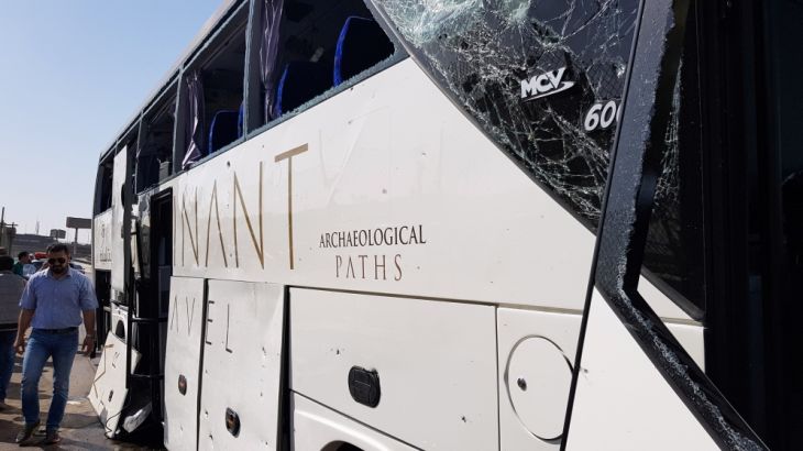 A damaged bus is seen at the site of a blast near a new museum being built close to the Giza pyramids in Cairo, Egypt May 19, 2019.