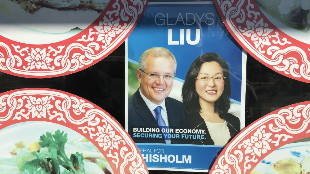 A flier for Liberal candidate Gladys Liu in the window of a Chinese restaurant in Box Hill [Max Walden/Al Jazeera]