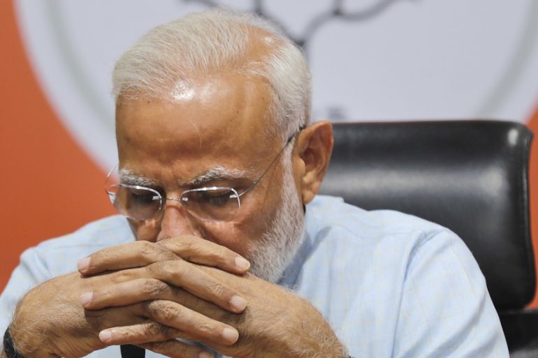 Indian Prime Minister Narendra Modi attends a press conference at the party headquarters in New Delhi, India, Friday, May 17, 2019
