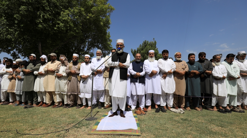 Siraj ul Haq, head of Pakistan's political and religious party Jama'at e Islami, leads the funeral prayers in absentia for the former Egyptian President Mohamed Mursi, in Peshawar