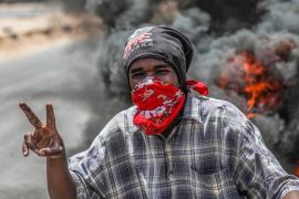 Demonstrations in Sudan - - KHARTOUM, SUDAN - JUNE 03 : Sudanese protesters burn tyres and set up barricades on roads to army headquarters after the intervention of Sudanese army, during a demonstrati