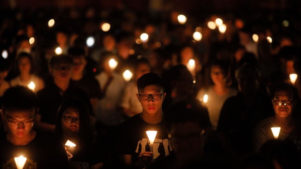 Tiananmen Square:  Tens of thousands attend an annual candlelight vigil at Hong Kong's Victoria Park 