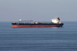 Oil tankers pass through the Strait of Hormuz