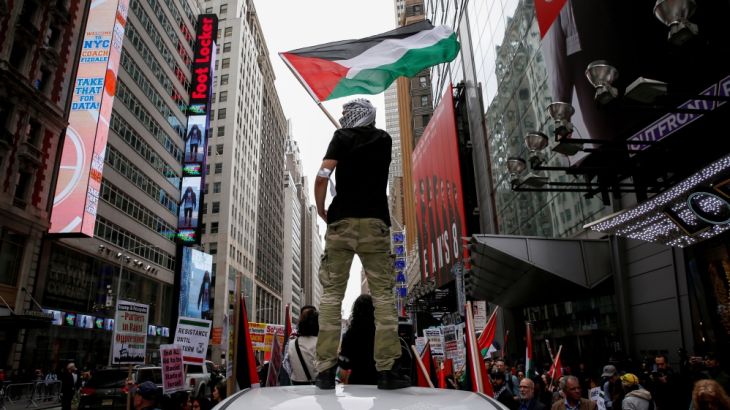 Demonstrators take part in a pro-Palestine rally in New York
