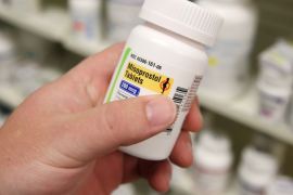 A pharmacist shows a bottle of the drug Misoprostol, made by Lupin Pharmaceuticals, at a pharmacy in Provo