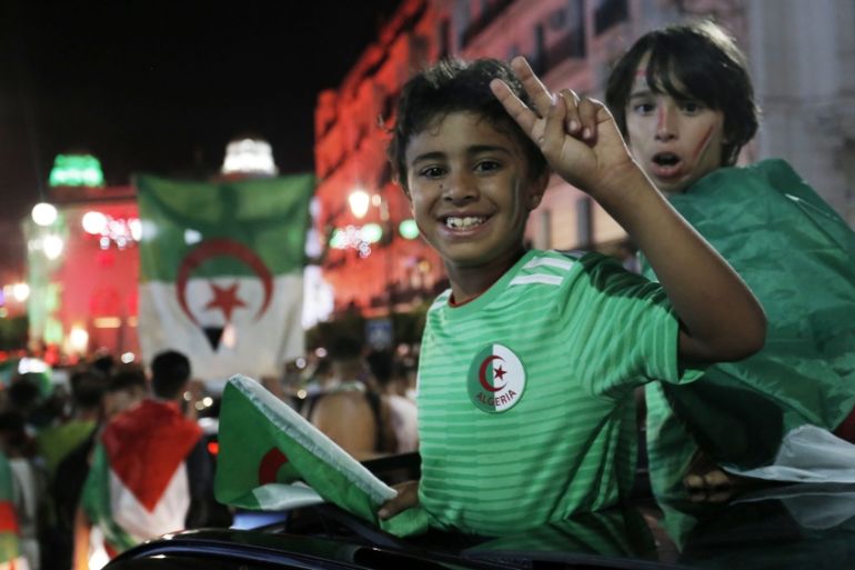 Algerian fans celebrate