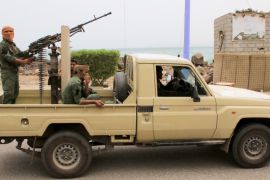 Bodyguards of Yemen''s southern separatist leaders are seen on a vehicle during a funeral for Brigadier General Muneer al-Yafee and his comrades killed in a Houthi missile attack, in Aden