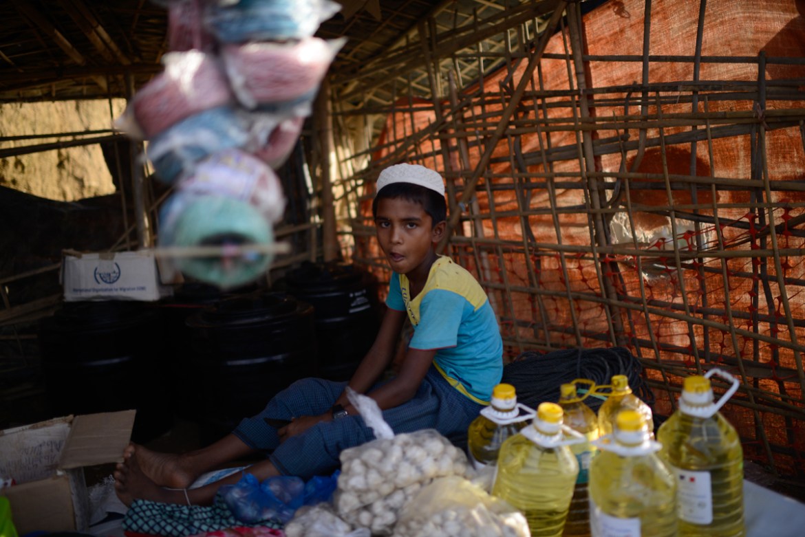 A young roingya refugee boy run a store at Balukhali camp. Mahmud Hossain Opu/Al Jazeera