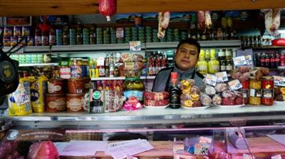 Luis: Luis Coronel stands in a cheese and charcuterie shop where he works in the Buenos Aires neighbourhood of Floresta/Photo Natalie Alcoba