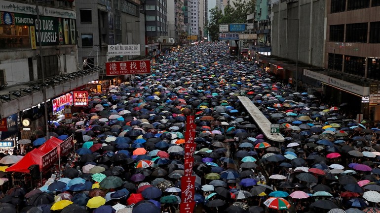 Anti-extradition bill protesters march to demand democracy and political reforms, in Hong Kong, China August 18, 2019. REUTERS/Tyrone Siu