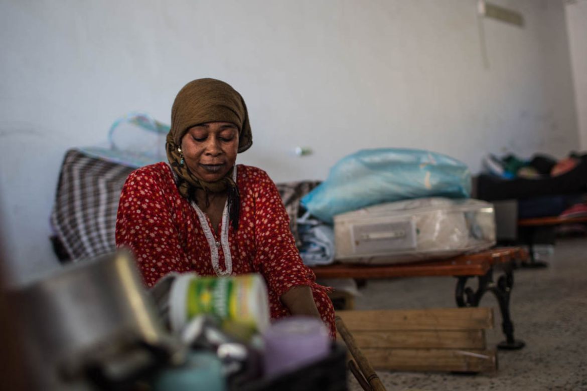 Nefisa Ahmedsaidmussa, 45 years old, from Darfur, lost her husband and 2 sons in the war in Sudan. He is in the improvised camp since clashes begun in Apri in south Tripoli areal.