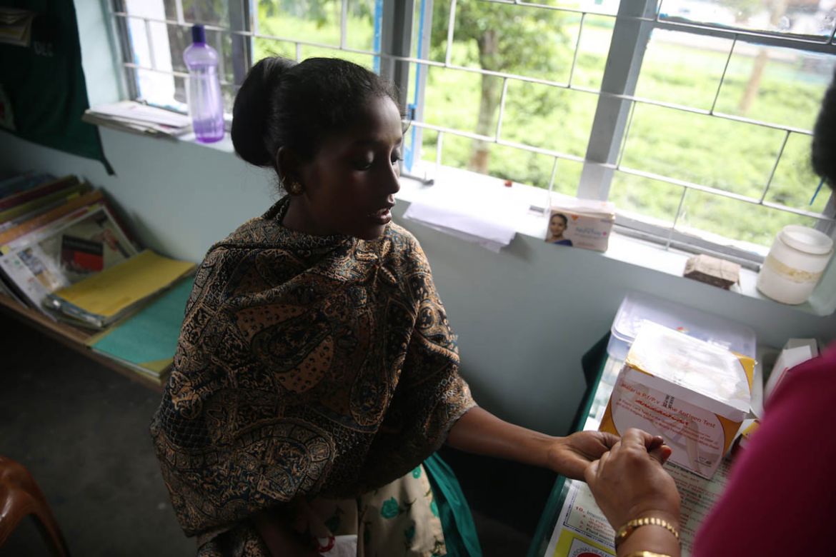 A tribal woman visits the government-run primary health center for treatment of fever. Health issues including malnutrition, vector diseases are rampant in the area but the farmers do not have access