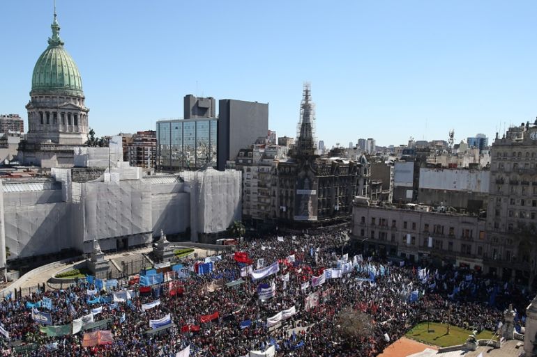 People attend a demonstration against economic measures of Argentine President Mauricio Macri''s government