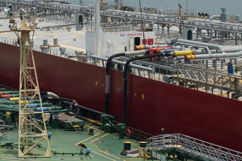 An oil tanker for blending to reproduce low-sulphur fuel oil with half-finished products of SK Trading International is seen during a marine blending at the sea off Singapore