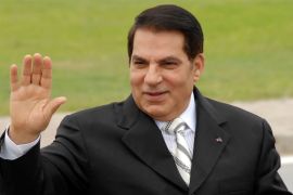 FILE - In this Oct.11, 2009 file photo, then Tunisian President Zine El Abidine Ben Ali waves from his car as he arrives at campaign rally in Rades, outside Tunis.