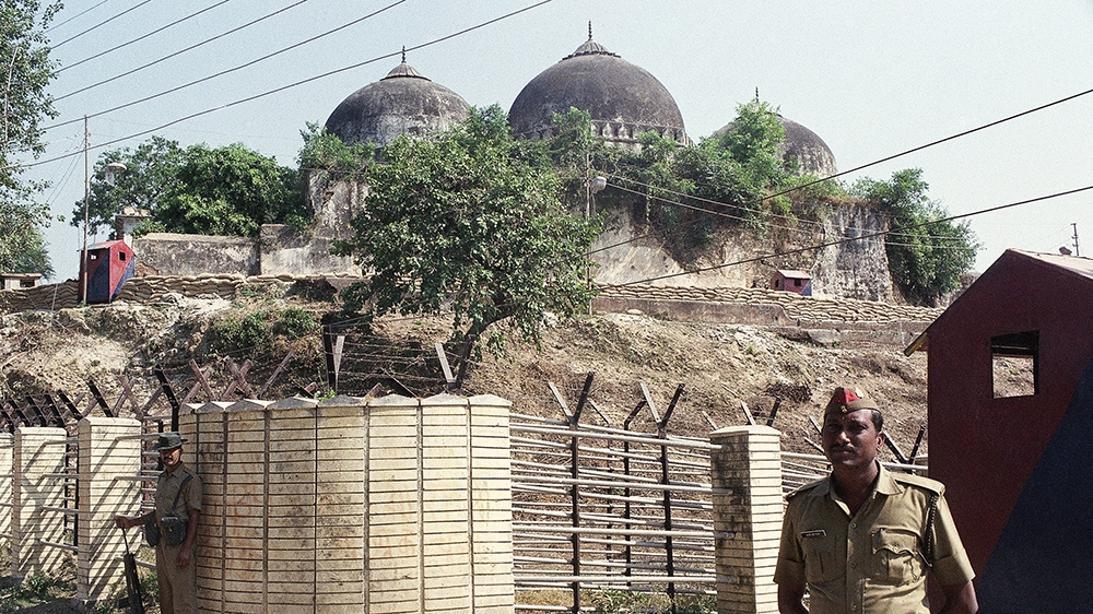 Indian security forces guard the Babri Mosque in Ayodhya, Oct. 29, 1990, closing off the disputed site claimed by Muslims and Hindus. The dispute is at the center of a major religious and political st