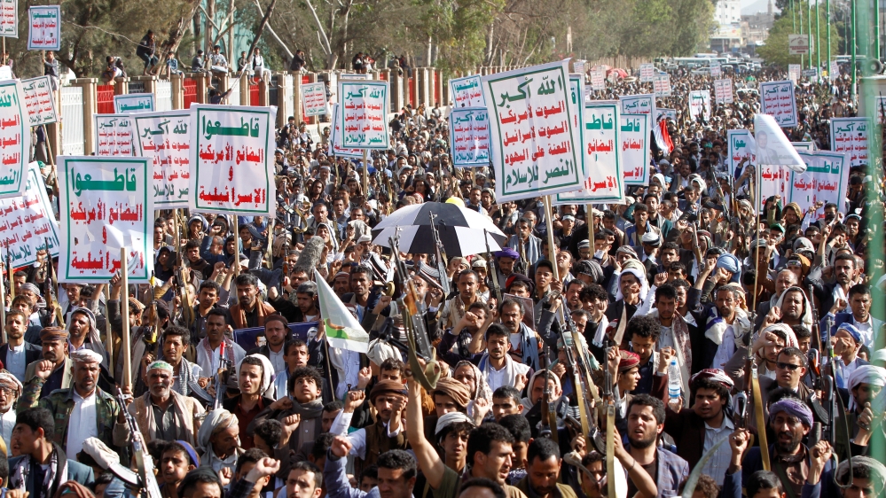 Supporters of the Houthi movement attend a rally to celebrate following claims of military advances by the group near the borders with Saudi Arabia, in Sanaa