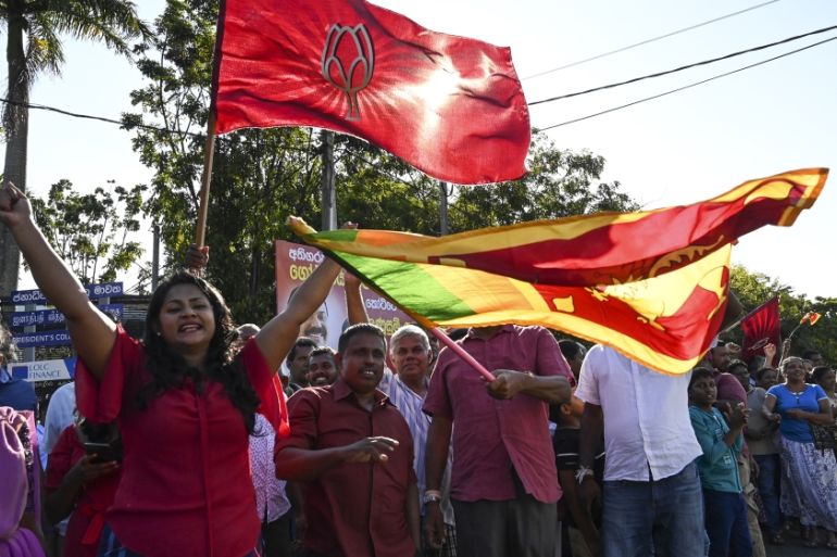Supporters of Sri Lanka''s President-elect Gotabaya Rajapaksa cheer near the election commission office in Colombo on November 17, 2019. Gotabaya Rajapaksa, who spearheaded the brutal crushing of the T