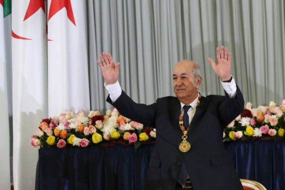 Newly elected Algerian President Abdelmadjid Tebboune gestures during a swearing-in ceremony in Algiers