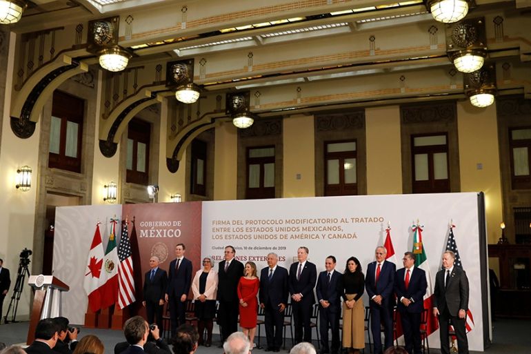Mexico''s President Andres Manuel Lopez Obrador, Canadian Deputy Prime Minister Chrystia Freeland and US Trade Representative Robert Lighthizer pose next to other representatives during a meeting at