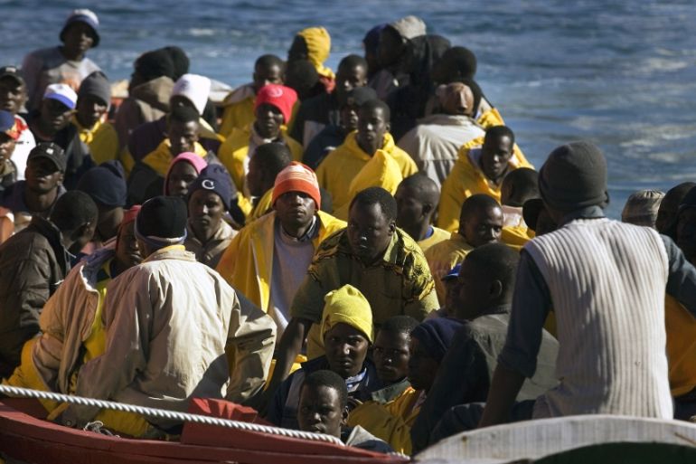 African immigrants arrive in a fishing boat carrying 60 to the port of Los Cristianos, in the Canary island of Tenerife, Spain, Thursday, Feb. 1, 2007. More than 31,000 migrants, mostly from Africa, r