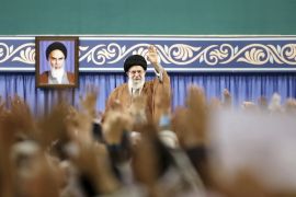 Iran's Supreme Leader Ayatollah Khamenei waves to members of the Revolutionary Guard's all-volunteer Basij force in Tehran, Iran,Nov 27, 2019 [The office of the Supreme Leader via AP]
