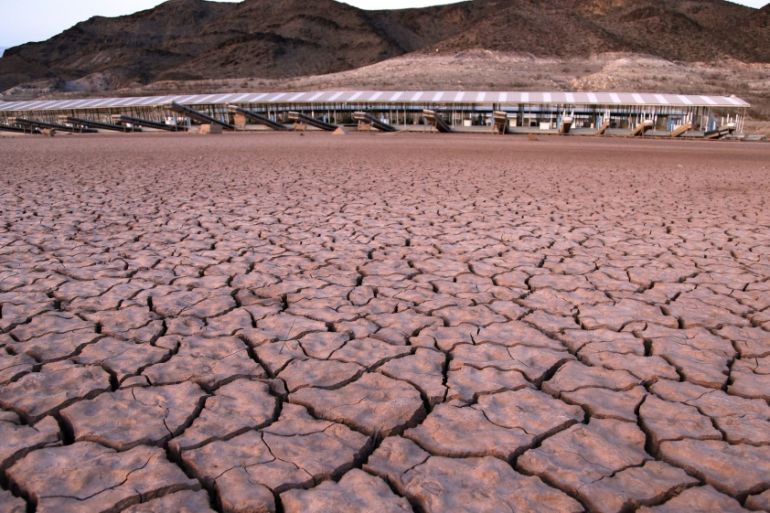 What was once a marina sits high and dry due to Lake Mead receding in the Lake Mead National Recreation Area in Arizona. Extreme swings in weather are expected as part of a changing climate [File:John