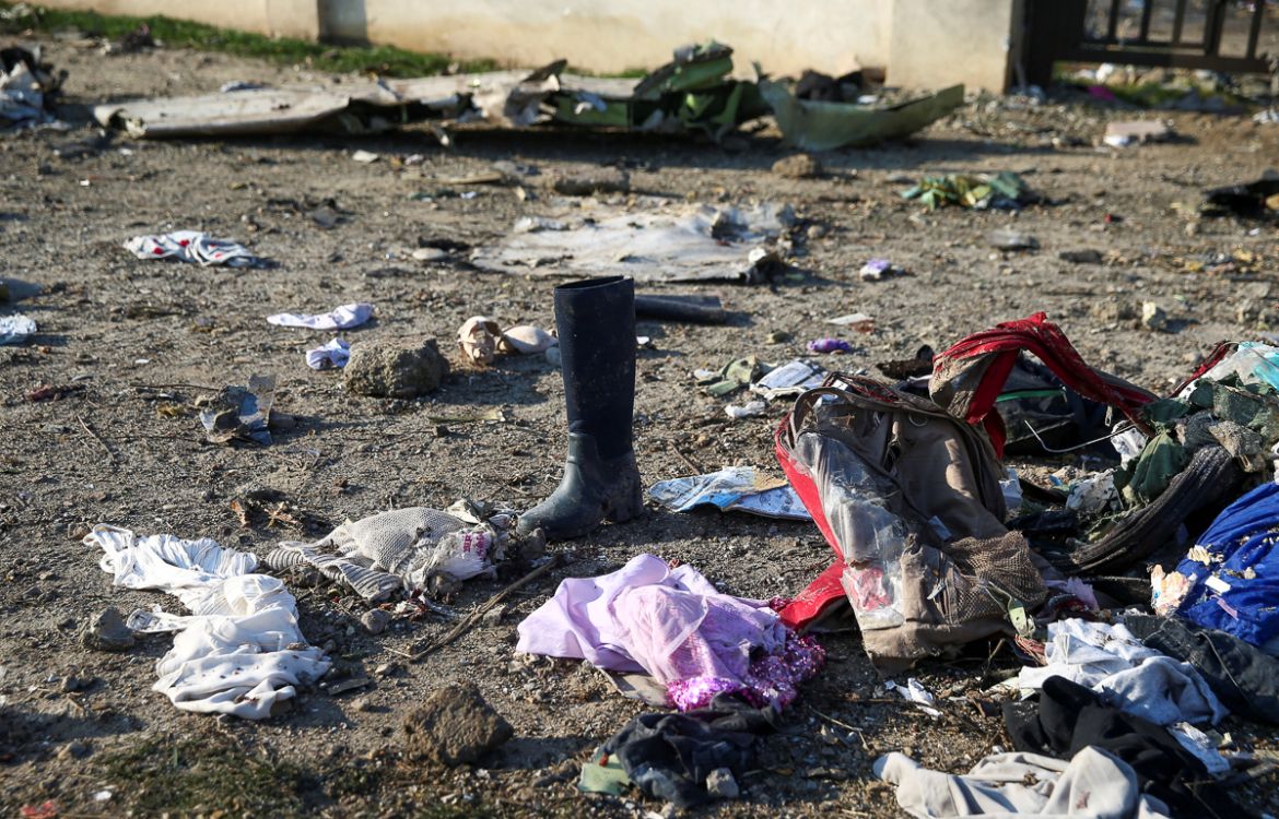 Passengers'' belongings are pictured at the site where the Ukraine International Airlines plane crashed after take-off from Iran''s Imam Khomeini airport, on the outskirts of Tehran, Iran January 8, 202
