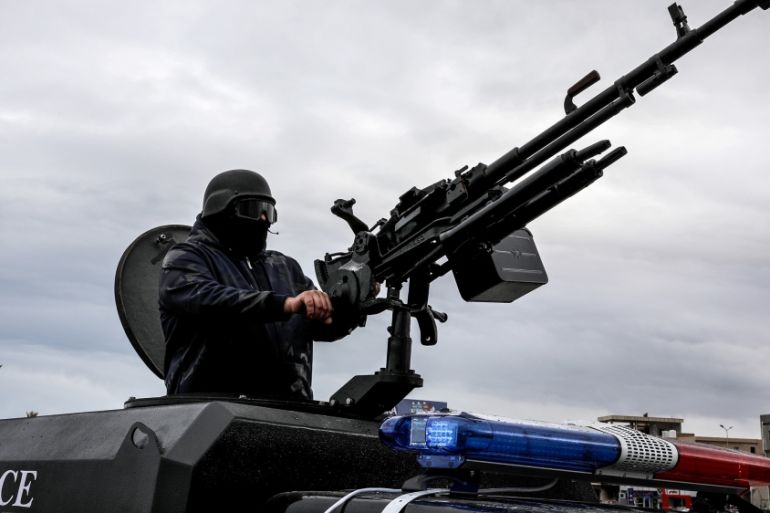 A member of the central security support force holds a weapon during the security deployment in the Tajura neighborhood, east of Tripoli, Libya December 30, 2019. REUTERS/Ismail Zitouny