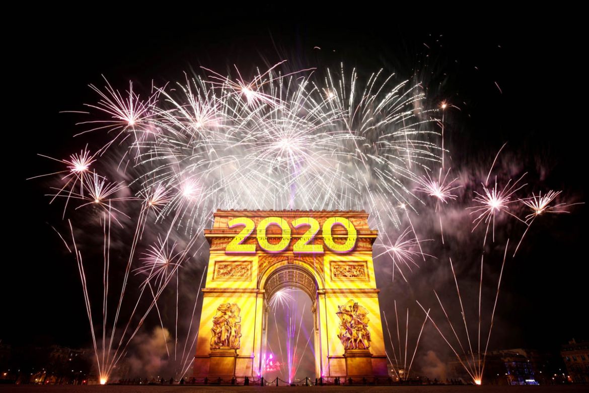 Fireworks illuminate the sky over the Arc de Triomphe during the New Year''s celebrations on the Champs Elysees in Paris, France January 1, 2020. REUTERS/Benoit Tessier TPX IMAGES OF THE DAY