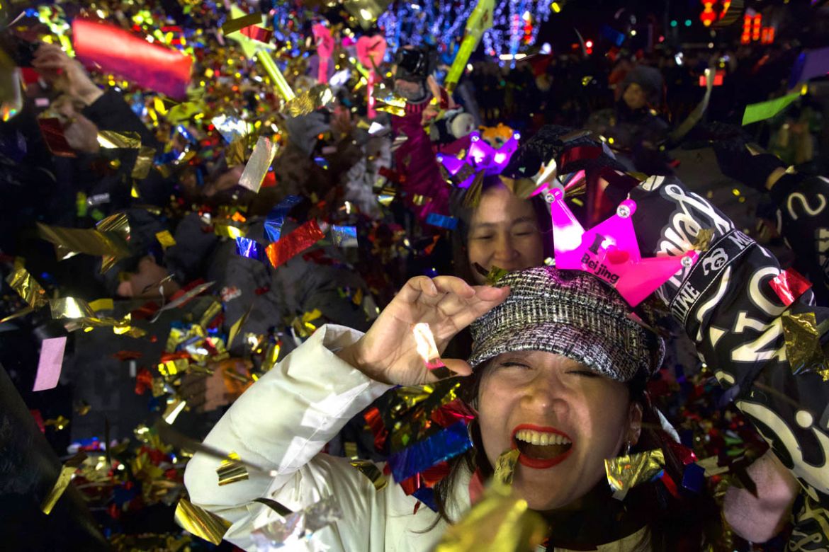 People celebrate the arrival of the year 2020 at a New Year''s Eve countdown event near the 2022 Beijing Winter Olympic headquarters in Bejing, Wednesday, Jan. 1, 2020. Revellers around the globe are b