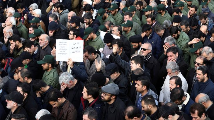 Demonstrators react during a protest against the assassination of the Iranian Major-General Qassem Soleimani, head of the elite Quds Force, and Iraqi militia commander Abu Mahdi al-Muhandis who were k