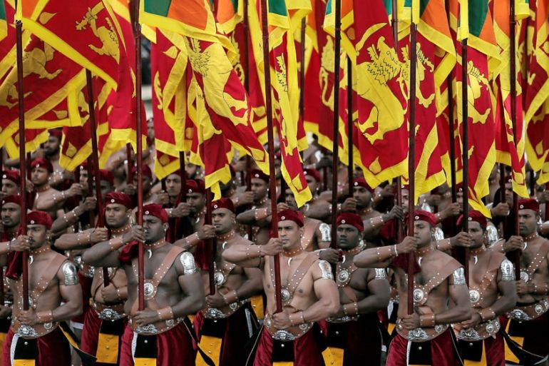 Sri Lanka''s military march with national flags during the 72nd independence day ceremony, in Colombo