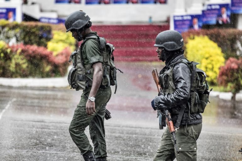 Members of the Cameroonian Gendarmerie patrols in the Omar Bongo Square of Cameroon''s majority anglophone South West province capital Buea on October 3, 2018 during a political rally of the ruling CPD