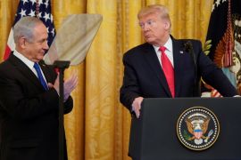 Donald Trump looks at Israel&#39;s Benjamin Netanyahu during a joint news conference to announce a new Middle East peace plan proposal in Washington, DC, on January 28, 2020 [Joshua Roberts/Reuters]
