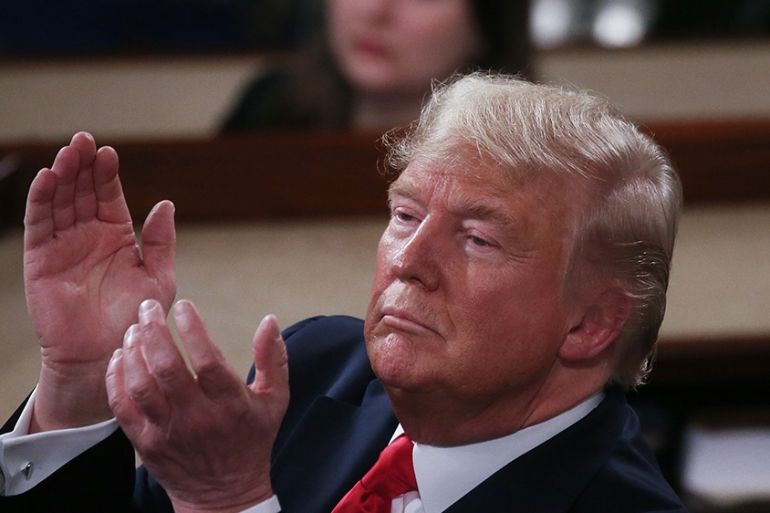WASHINGTON, DC - FEBRUARY 04: President Donald Trump applauds as he delivers the State of the Union address in the chamber of the U.S. House of Representatives on February 04, 2020 in Washington, DC.