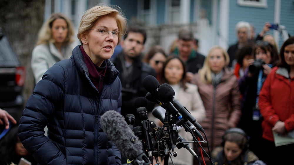 U.S. Senator Elizabeth Warren (D-MA) speaks to reporters, after announcing she has formed an exploratory committee to run for president in 2020, outside her home in Cambridge, Massachusetts, U.S., Dec