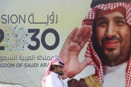 A banner advertises Saudi Crown Prince Mohammed bin Salman's Vision 2030 outside a mall in Jeddah, Saudi Arabia on February 5, 2020 [File: AP/Amr Nabil]