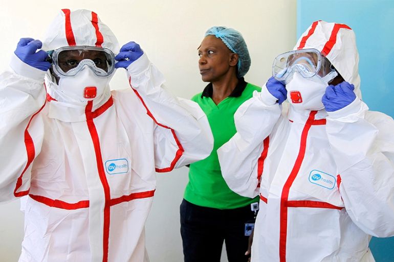 FILE PHOTO: Kenyan nurses wear protective gear during a demonstration of preparations for any potential coronavirus cases at the Mbagathi Hospital, isolation centre for the disease, in Nairobi, Kenya