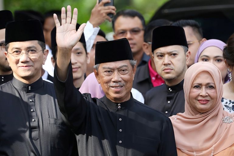Malaysia''s Prime Minister Designate and former interior minister Muhyiddin Yassin waves to reporters before his inauguration as the 8th prime minister, outside his residence in Kuala Lumpur, Malaysia,