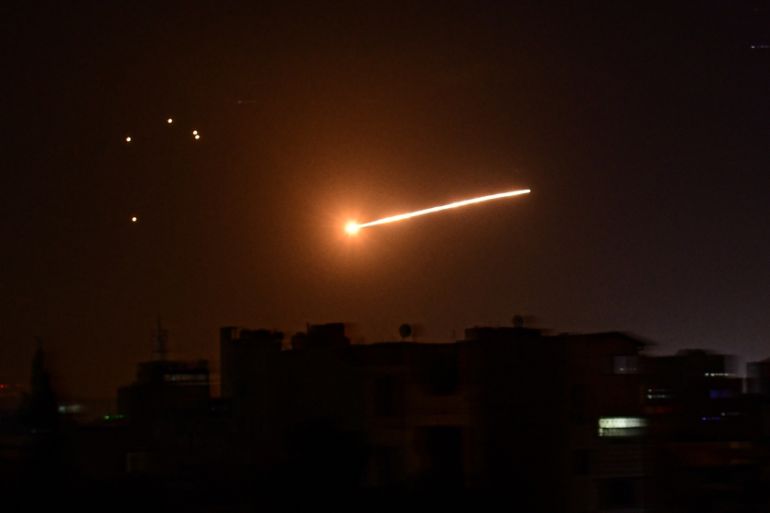 A handout picture released by the official Syrian Arab News Agency (SANA) on February 24, 2020, reportedly shows Syrian air defence intercepting an Israeli missile in the sky over the Syrian capital D