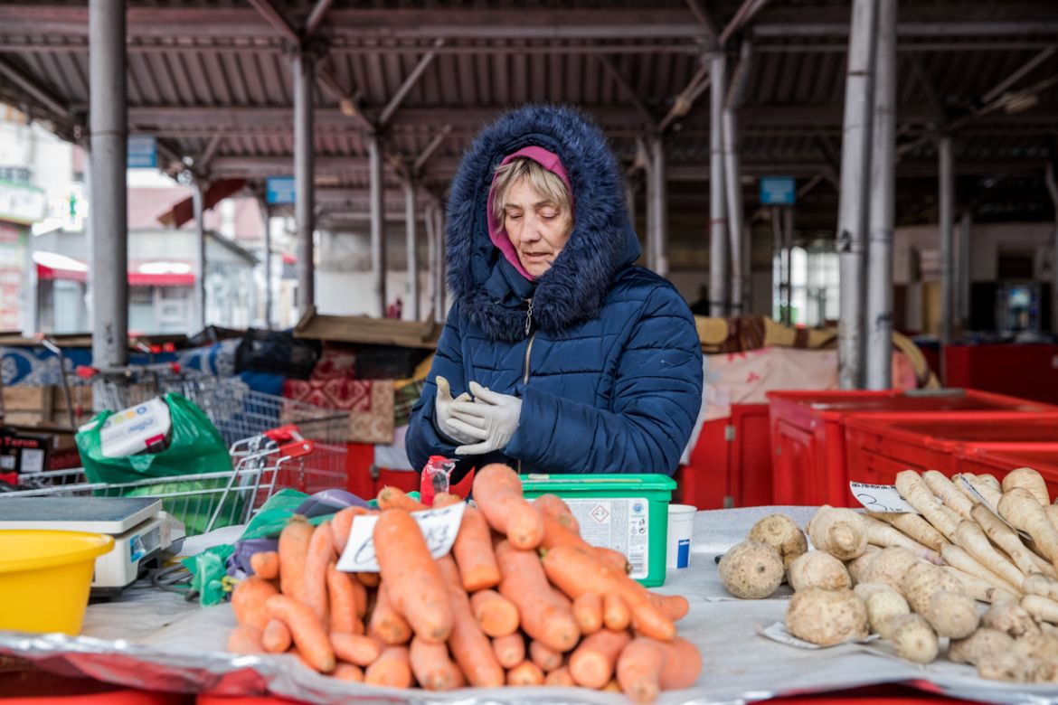 Come rain or shine or virus, Estera, 59 comes from her home village, Buzescu to sell vegetables in the market in Alexandria. Alexandria, March 24th, 2020 (March 24: 762 confirmed cases, 8 deaths)