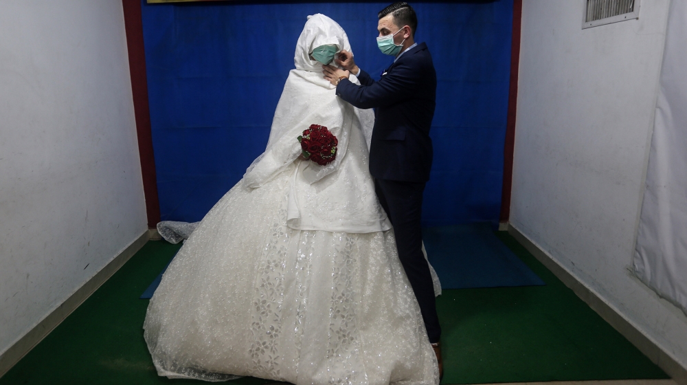 Coronavirus wedding story [Hana Salah/Al Jazeera]