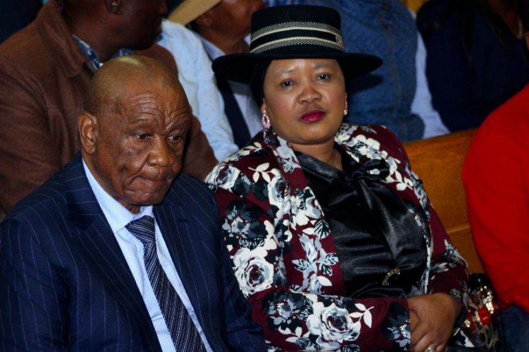 Lesotho''s Prime Minister, Thomas Thabane, left, and his wife Maesaiah, right are seated in court, in Maseru, Monday, Feb. 24, 2020. Thabane appeared in court on Monday