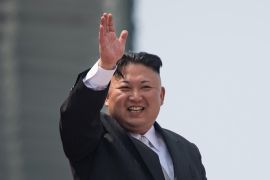 (FILES) This file photo taken on April 15, 2017 shows North Korean leader Kim Jong Un waving from a balcony of the Grand People''s Study House following a military parade marking the 105th anniversary