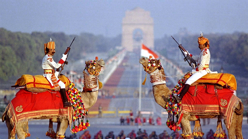 Two camel riders of India's paramilitary Border Security Force stand guard in traditional costumes in New Delhi January 24 during a dress rehearsal for the country's January 26 Republic Day celebratio